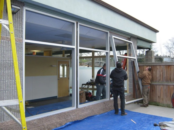 Professional installation of energy-efficient commercial glass and aluminum doors in a business property in Glenwood Springs Colorado.