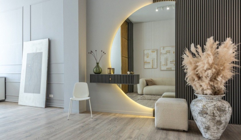 Professional installation of a decorative custom wall mirror in a residential or commercial property in Grand Junction Colorado.