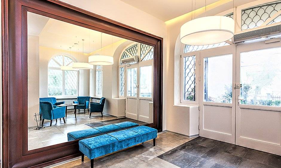 Professional installation of a custom wall mirror in a residential or commercial property in Grand Junction Colorado.