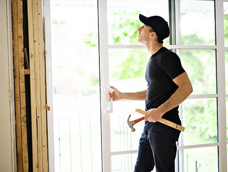 Professional technician providing trusted commercial and residential door repair services in Glenwood Springs, Colorado.