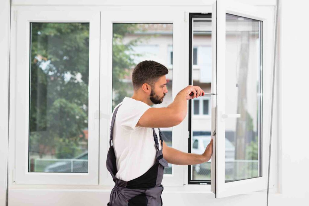 Professional technician repairing a window in Glenwood Springs