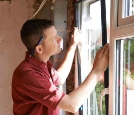 Technician performing after hours glass repair in Grand Junction
